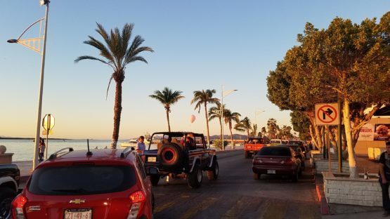 La Paz Waterfront with procession of Jeeps and FJ40's