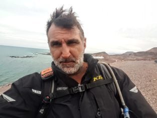 Peter J Ricci - Solo World Traveler by Motorbike